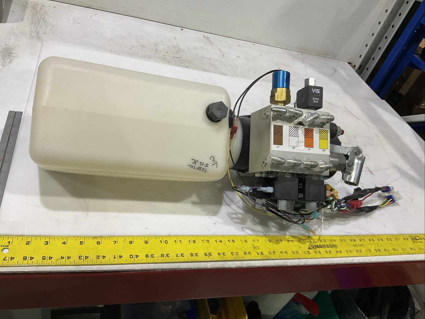 WOMACK  S103T-4979  UNIDIRECTIONAL  LEVELING  PUMP   J5A7