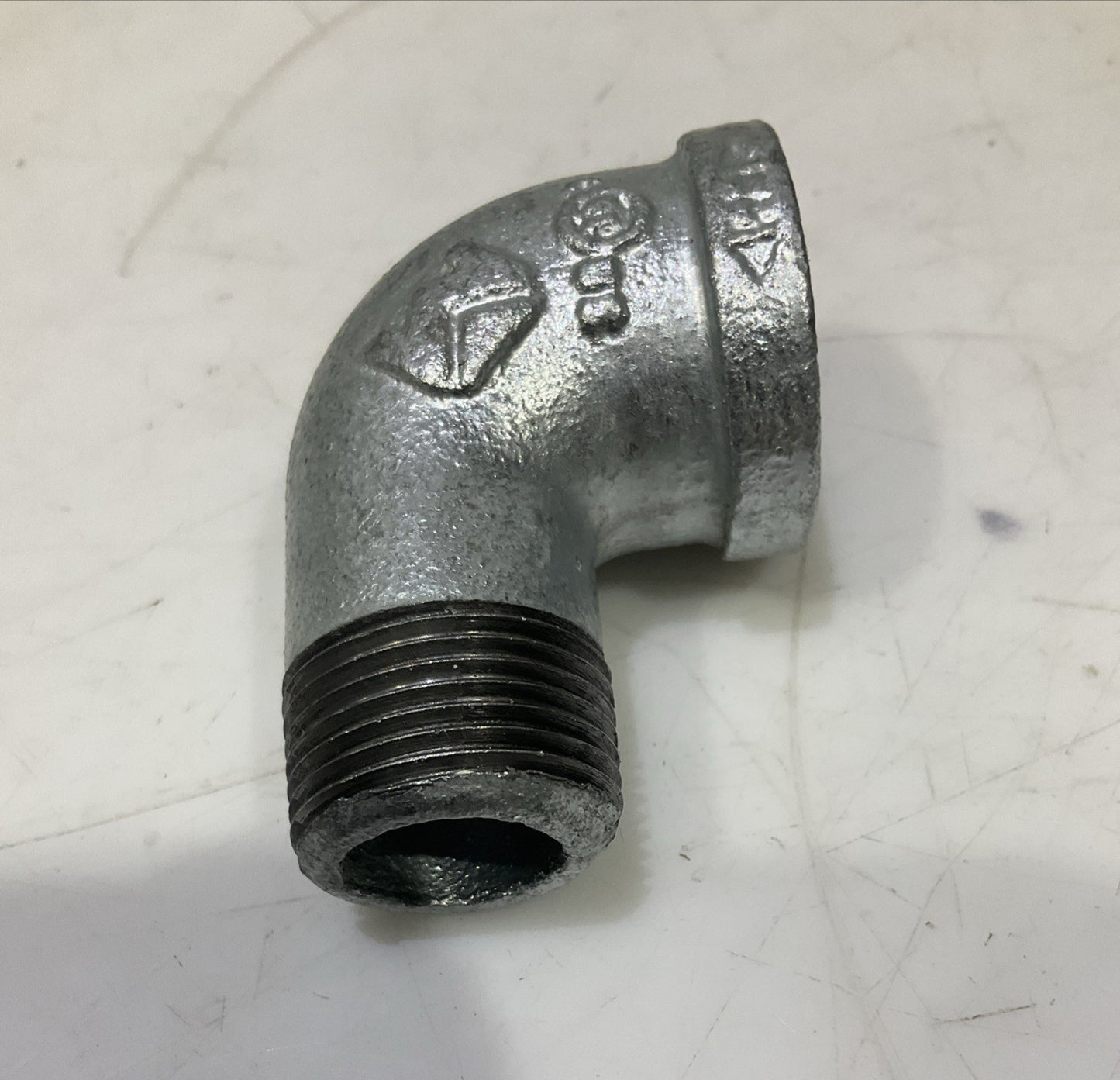 RB  0022081  3/4 GALVANIZED IRON  90 FIP x MIP STREET  ELBOW  IN  PLUG