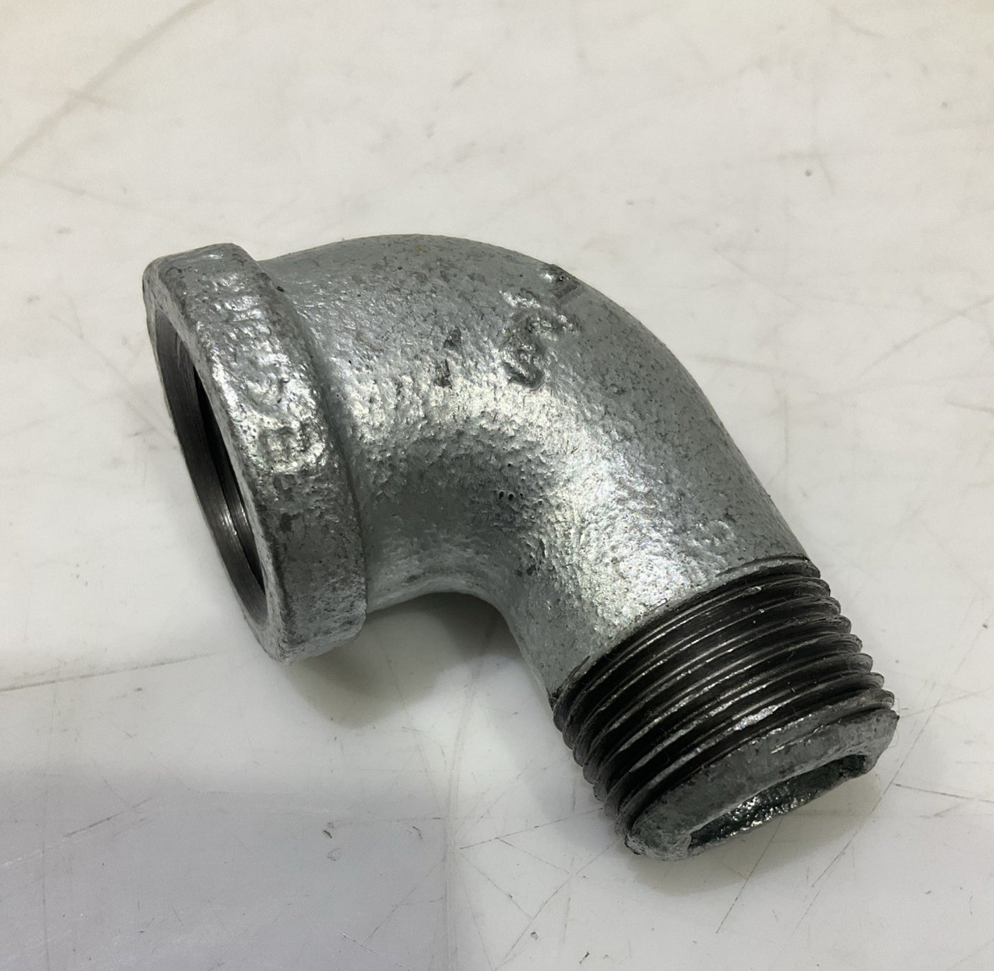 RB  0022081  3/4 GALVANIZED IRON  90 FIP x MIP STREET  ELBOW  IN  PLUG