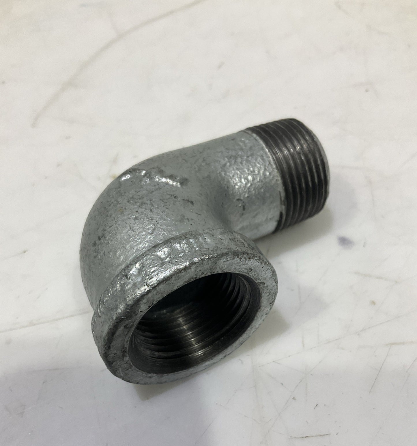 RB  0022081  3/4 GALVANIZED IRON  90 FIP x MIP STREET  ELBOW  IN  PLUG