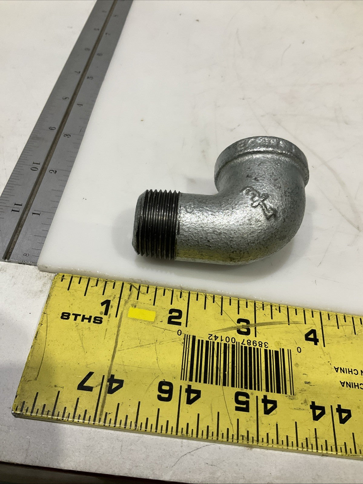 RB  0022081  3/4 GALVANIZED IRON  90 FIP x MIP STREET  ELBOW  IN  PLUG