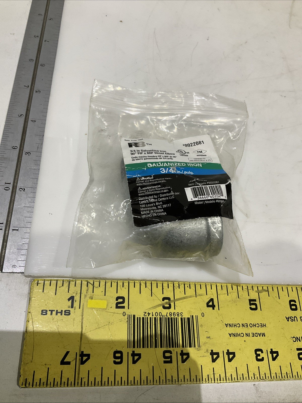 RB  0022081  3/4 GALVANIZED IRON  90 FIP x MIP STREET  ELBOW  IN  PLUG