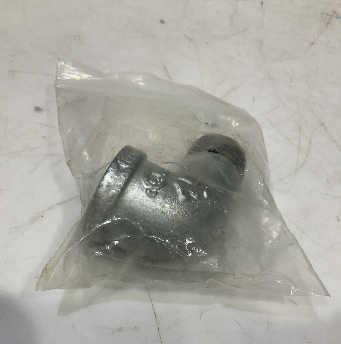 RB  0022081  3/4 GALVANIZED IRON  90 FIP x MIP STREET  ELBOW  IN  PLUG