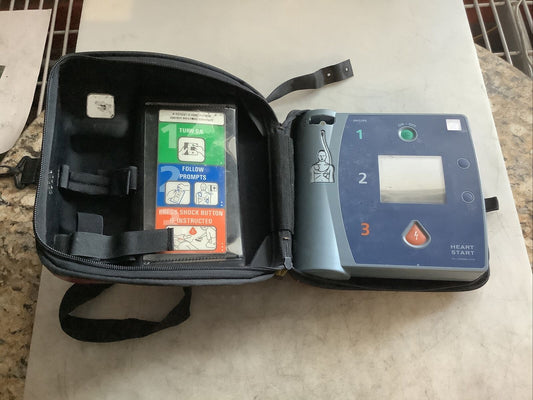 PHILIPS M3861A HEARTSTART DEFIBRILLATOR W/ NO BATTERY NO PAD NO MEMORY CARD